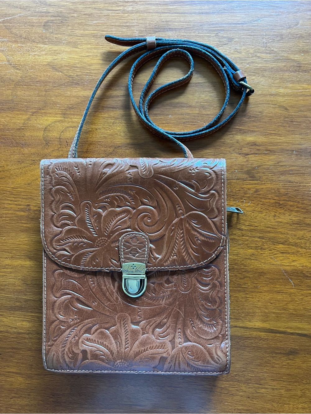 Patricia Nash Master Organizer Crossbody.  Beautiful tooled leather and brass